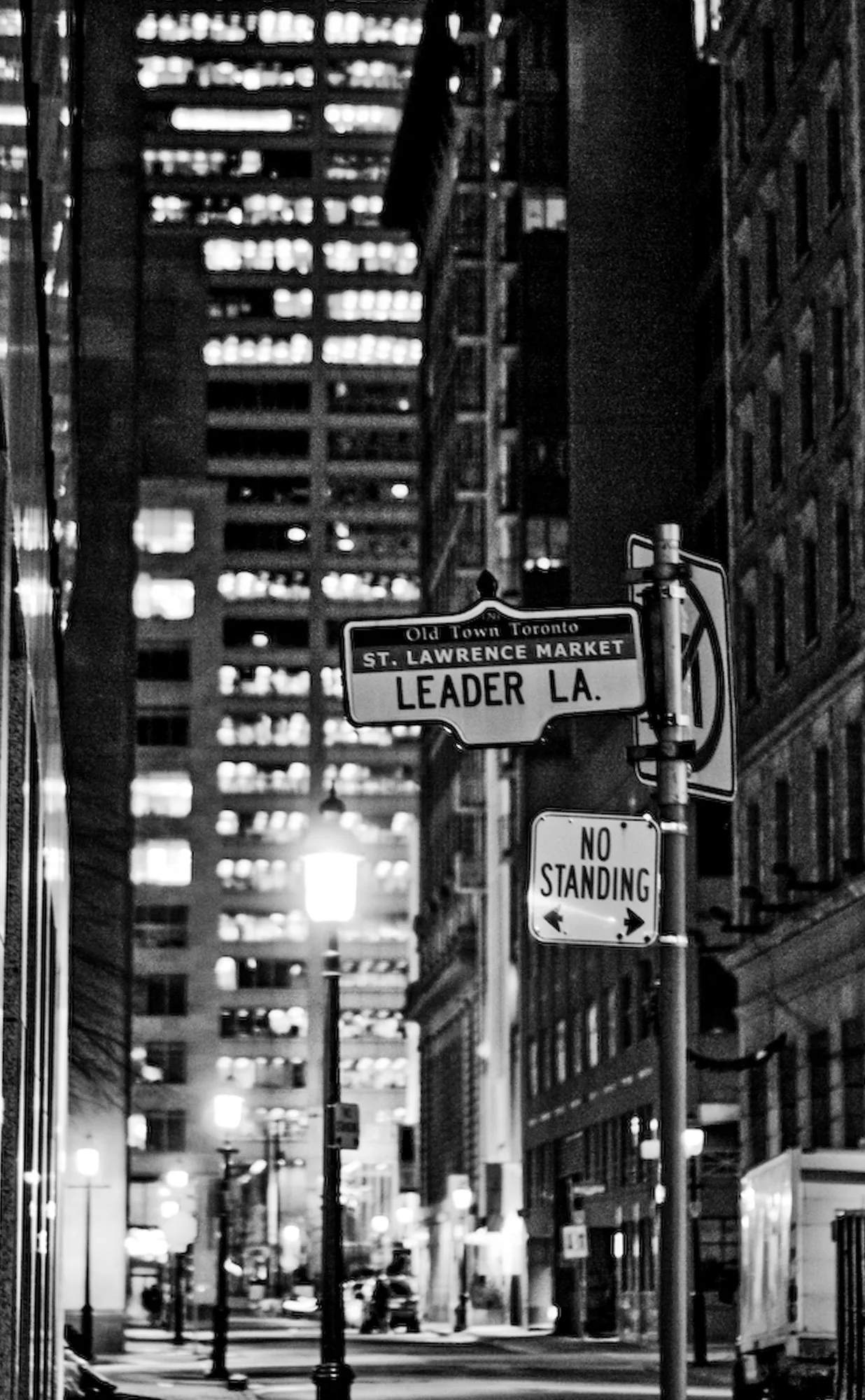 Old Town Toronto street sign lit up on a city street at night, personal photography
